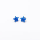 blue glitter small star earrings