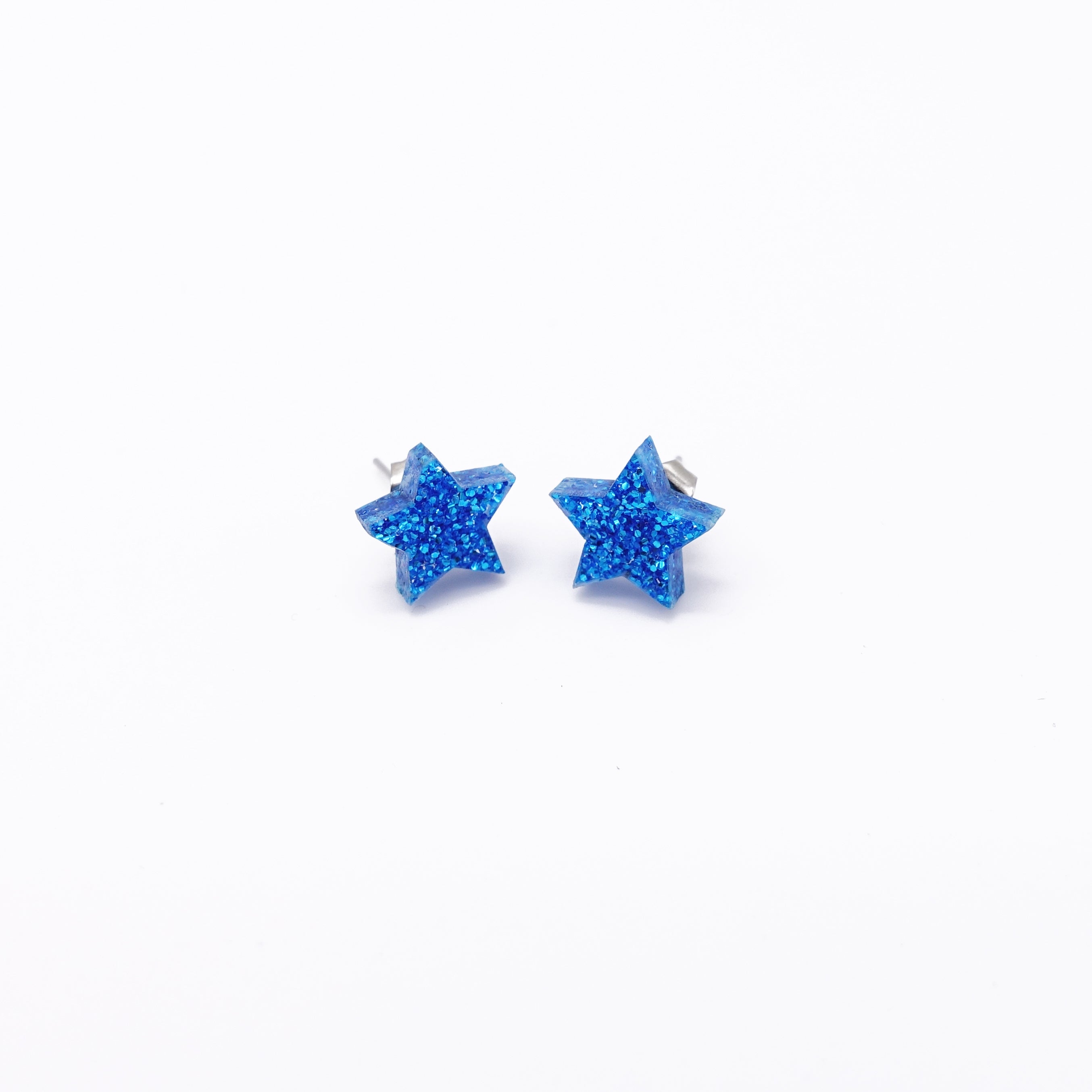 blue glitter small star earrings