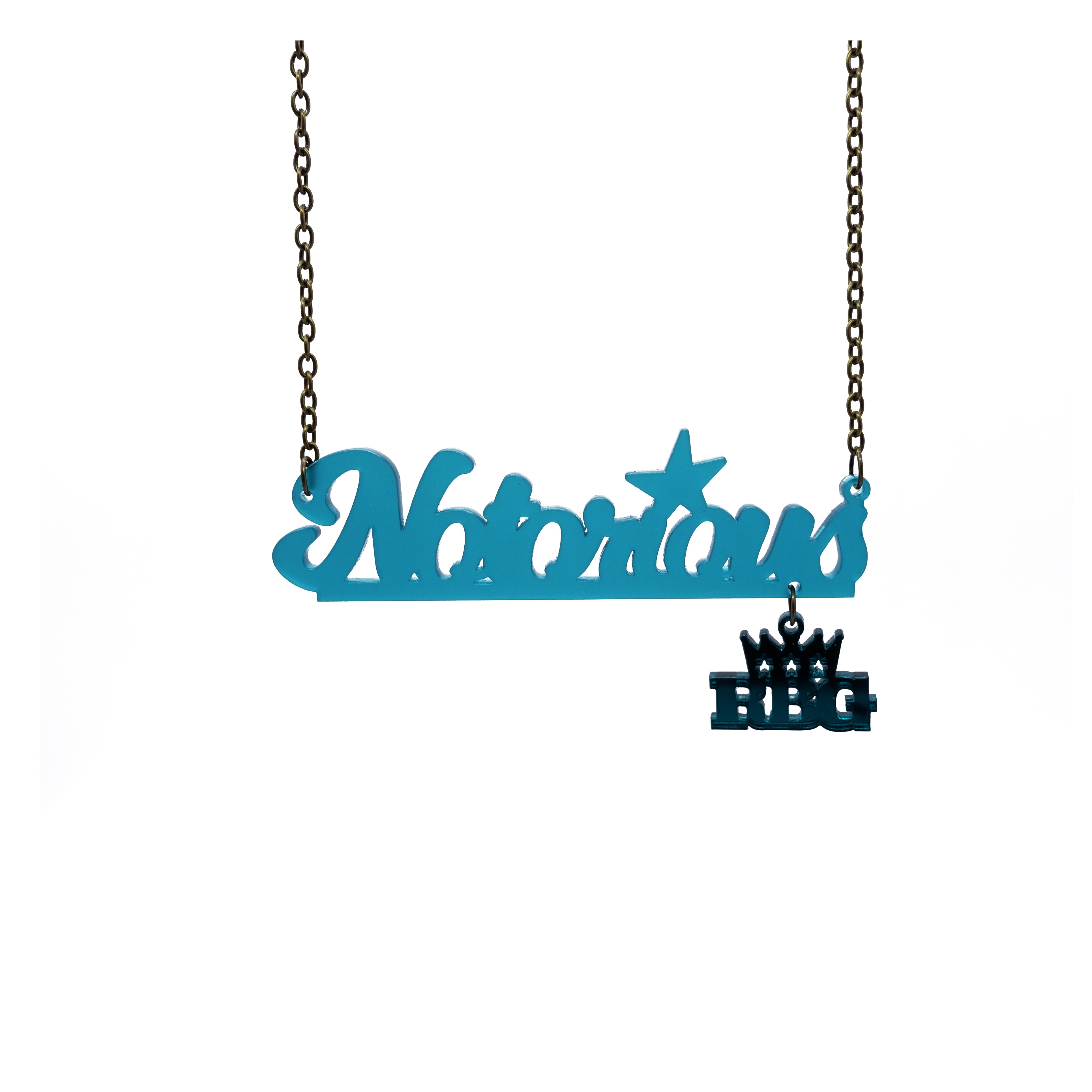 Notorious RBG necklace in teal frost in honour of Ruth Bader Ginsburg