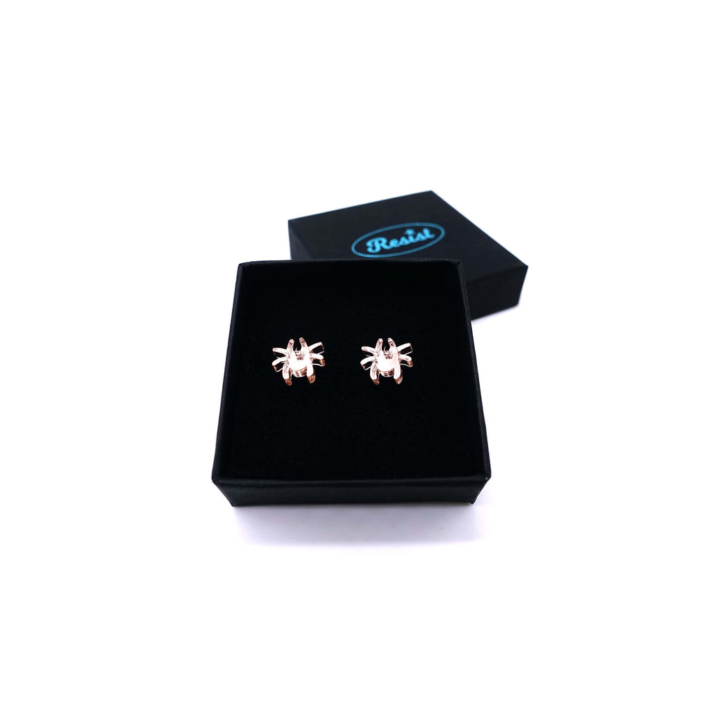 Tiny spider earrings in rose-gold mirror,  shown in gift box. 